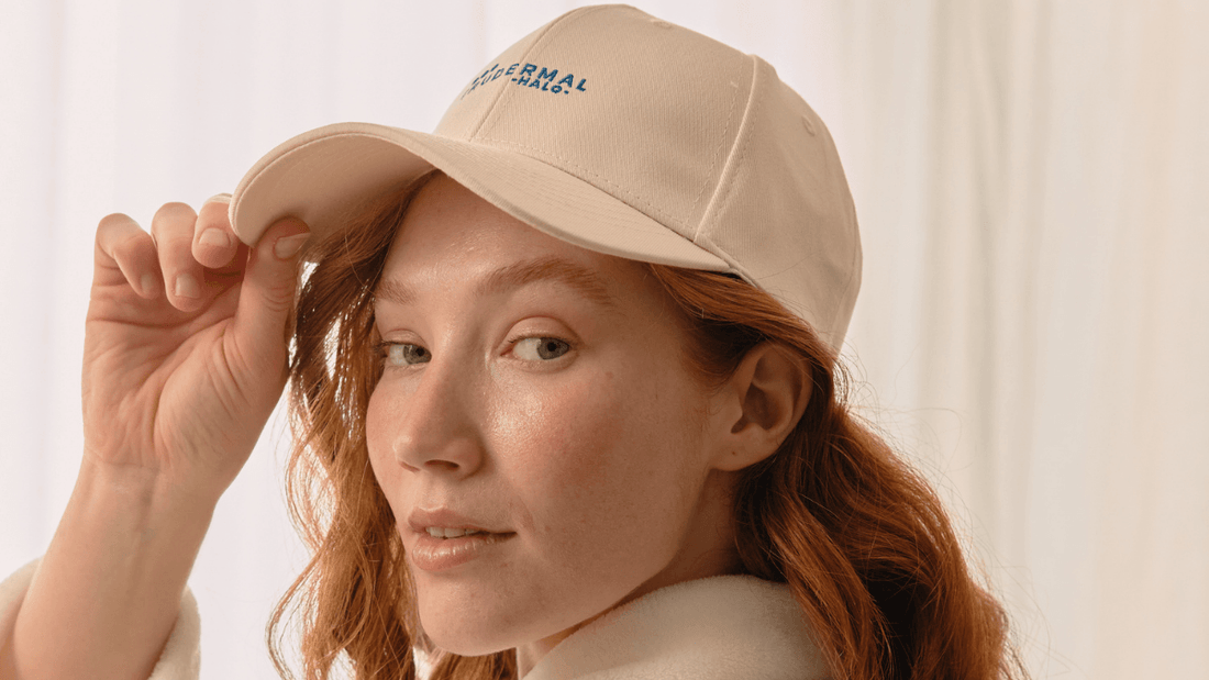 Girl wearing hair growth cap